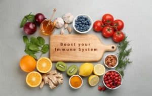 A smiling child enjoying healthy foods and outdoor activities to boost their immune system naturally.